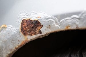 Should I Call an Auto Body Repair Shop for Small Rust Spots?